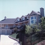 Front drive approach to a hillside home